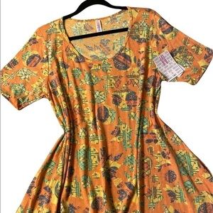 NWT LuLaRoe Perfect Tee swing top, w/flirty side slits & flattering half sleeve